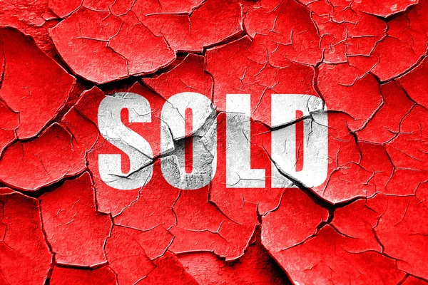 Grunge cracked sold sign background — Stock Photo, Image