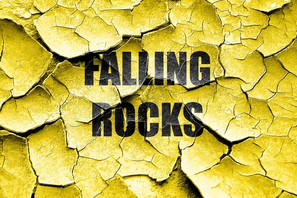 Grunge agrietado Cayendo rocas signo — Foto de Stock
