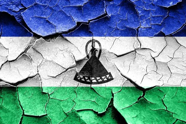 Grunge Lesotho zászló néhány repedések és a szüreti külsőt — Stock Fotó