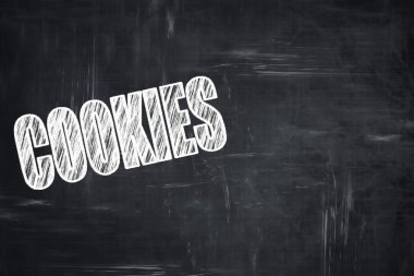 Kara tahta arka plan ile tebeşir harfler: lezzetli kurabiyeler işareti