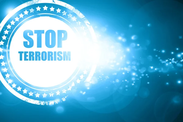 Sello azul sobre un fondo reluciente: detener el terrorismo — Foto de Stock