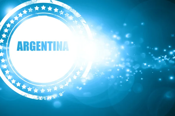 Blaue Briefmarke auf glitzerndem Hintergrund: Grüße aus Argentinien — Stockfoto