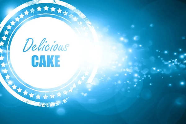 빛나는 배경에 파란색 스탬프: 맛 있는 케이크 로그인 — 스톡 사진
