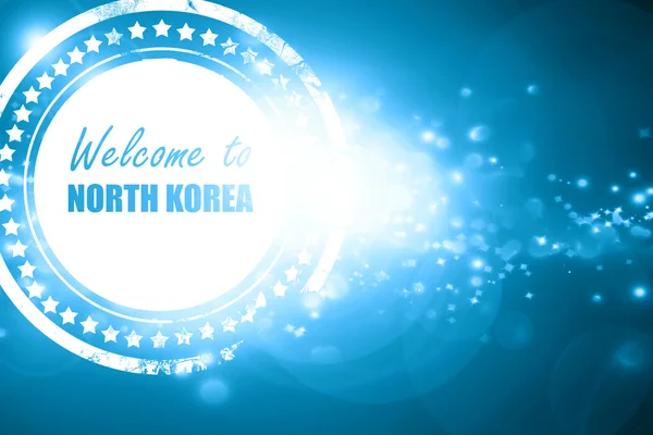 Pırıltılı zemin üzerine mavi pul: Kuzey Kore hoş geldiniz — Stok fotoğraf