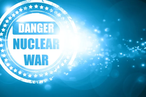 Niebieski znaczek na tle błyszczące: jądrowej niebezpieczeństwo tło — Zdjęcie stockowe