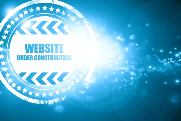 Blue stamp on a glittering background: Under construction sign — Stock Photo, Image