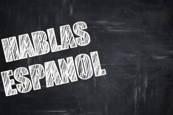 Chalkboard writing: hablas espanol — Stock Photo, Image