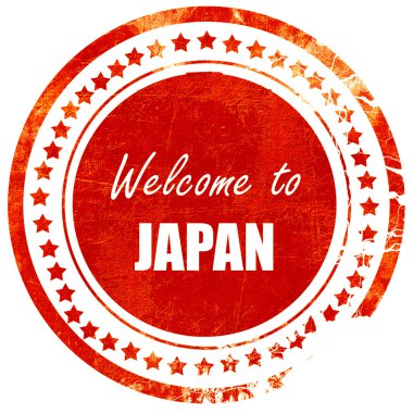 Japonya'ya hoş geldiniz, düz beyaz bir sırt üzerinde grunge kırmızı kauçuk damga