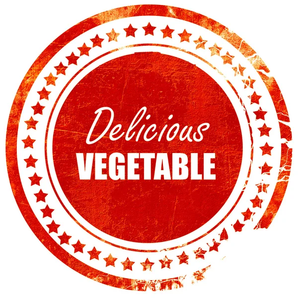 Delicious vegetable sign, grunge red rubber stamp on a solid whi