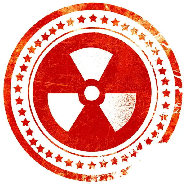 Fondo de peligro nuclear, sello de goma roja grunge en un sólido wh —  Fotos de Stock