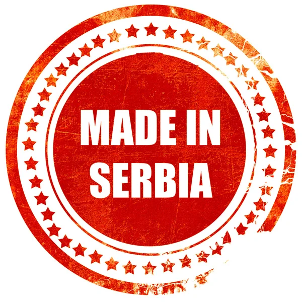 Vyroben v Srbsku, grungeové červené razítko na solidní bílé backgro — Stock fotografie