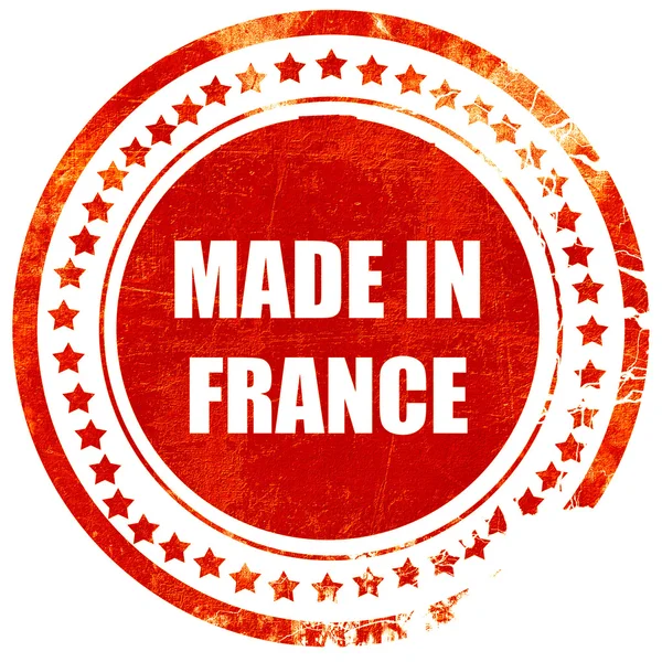 Zhotoveno ve Francii, grungeové červené razítko na solidní bílé backgro — Stock fotografie
