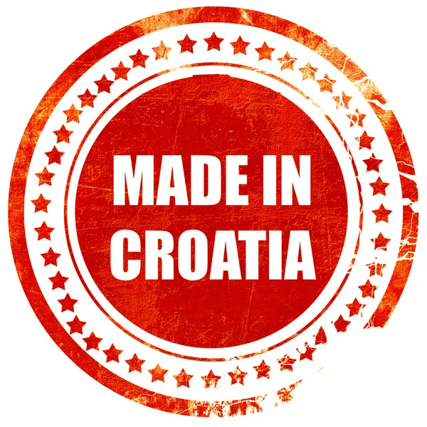 Feito em croácia, grunge selo de borracha vermelha em um backgr branco sólido — Fotografia de Stock