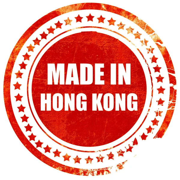 Feito em hong kong, grunge selo de borracha vermelha em uma parte traseira branca sólida — Fotografia de Stock