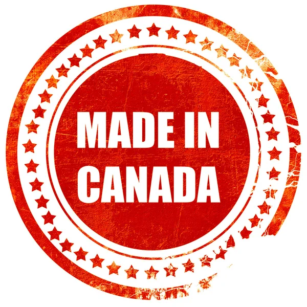 Kanada'da made in, düz beyaz backgro üzerinde grunge kırmızı kauçuk damga — Stok fotoğraf