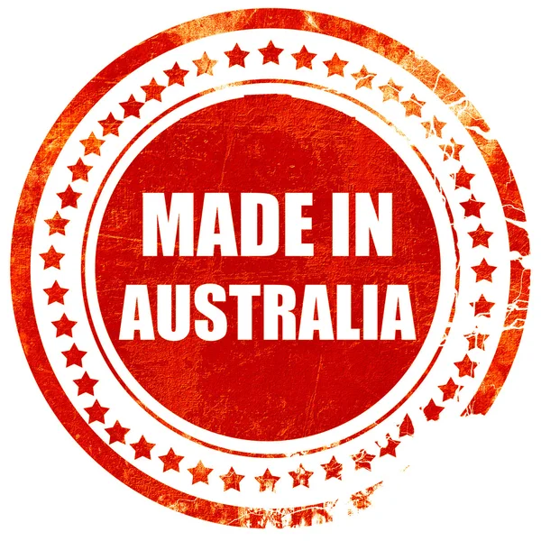 Зроблено в Австралії, грандж червоний каучуковий штамп на твердий білий назад — стокове фото
