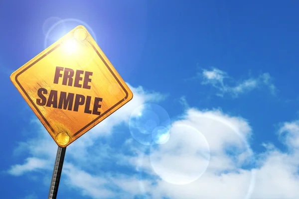 Yellow road sign with a blue sky and white clouds: free sample s — ストック写真