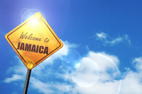 Yellow road sign with a blue sky and white clouds: Welcome to ja — Stock Photo, Image