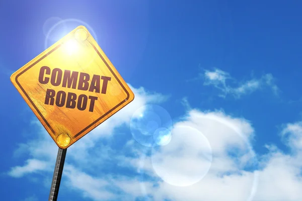Yellow road sign with a blue sky and white clouds: combat robot — Stok fotoğraf