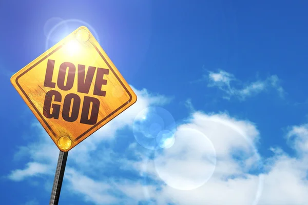 Verkeersbord met een blauwe hemel en witte wolken gele: god van de liefde — Stockfoto