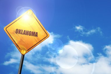 Sarı mavi bir gökyüzü ve beyaz bulutlar yol işaretiyle: oklahoma