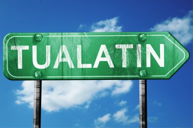 Tualatin yol işaret, yıpranmış ve hasarlı bir görünüm