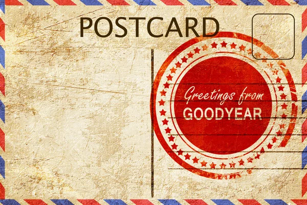 Goodyear stamp on a vintage, old postcard — Stock Photo, Image