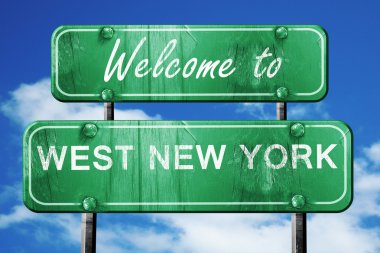 Batı new york vintage yeşil yol işareti mavi gökyüzü arka plan ile