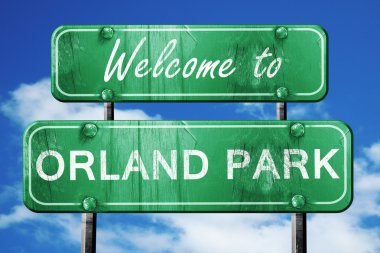 orland park vintage green road sign with blue sky background clipart