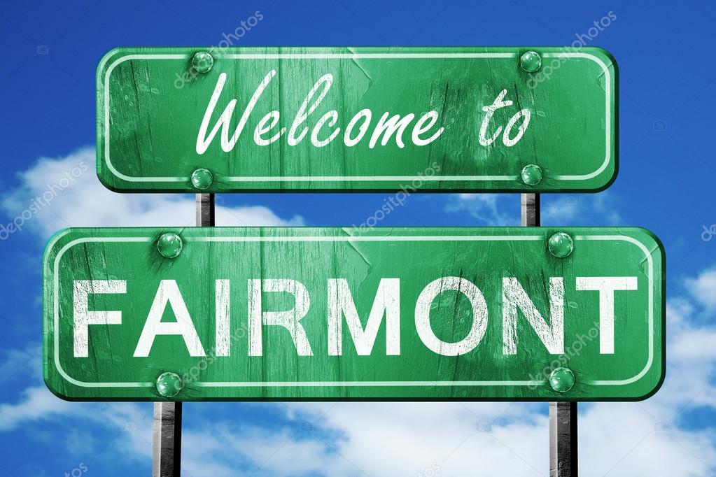 Fairmont vintage green road sign with blue sky background — Stock Photo © ellandar #106648618