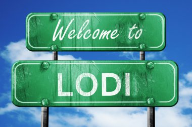 Lodi vintage yeşil yol işareti mavi gökyüzü arka plan ile