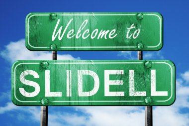 Slidell vintage yeşil yol işareti mavi gökyüzü arka plan ile