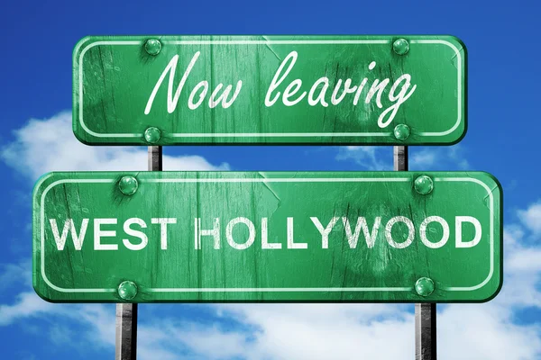 Saliendo del oeste de Hollywood, verde señal de carretera vintage con la lechuga áspera — Foto de Stock