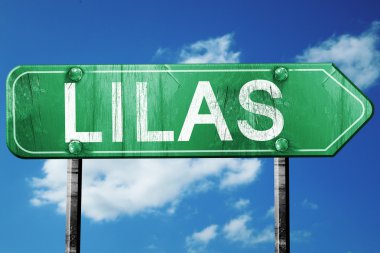 Lilas yol işaret, vintage bulutlar arka plan ile yeşil