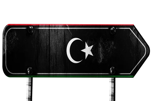 Libysche Flagge, 3D-Rendering, Straßenschild auf weißem Hintergrund — Stockfoto