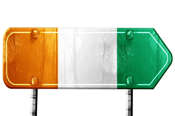 Ivory coast flag, 3D rendering, road sign on white background — Stock Photo, Image