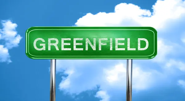 格林菲尔德和老式的绿色交通标志突出显示 — 图库照片