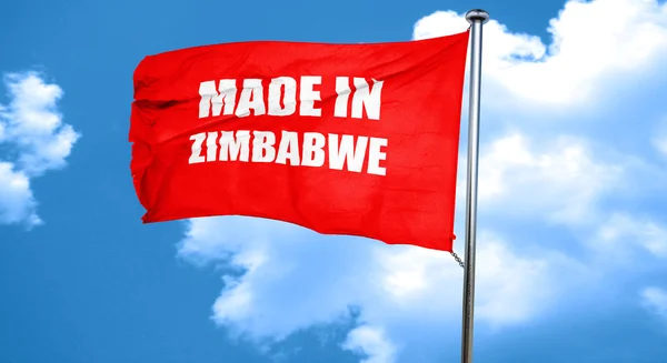 Hecho en zimbabwe, renderizado 3D, una bandera ondeante roja —  Fotos de Stock