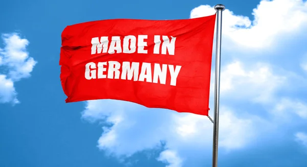 Made in Germany, 3D-Darstellung, eine rote Fahne schwenkend — Stockfoto