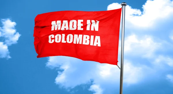 Hecho en Colombia, 3D renderizado, una bandera ondeante roja — Foto de Stock