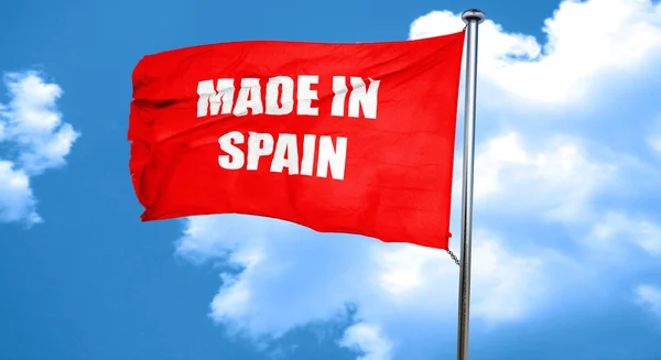 Made in spain, 3D rendering, a red waving flag — Stock Photo, Image
