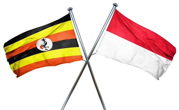 Флаг Уганды с флагом Индонезии, 3D рендеринг — стоковое фото