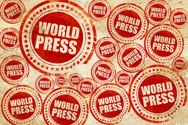 Prensa mundial, sello rojo en una textura de papel grunge — Foto de Stock