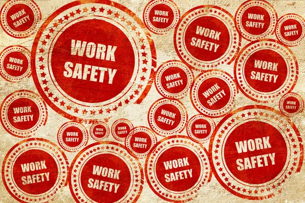 Signe de sécurité au travail, timbre rouge sur une texture de papier grunge — Photo