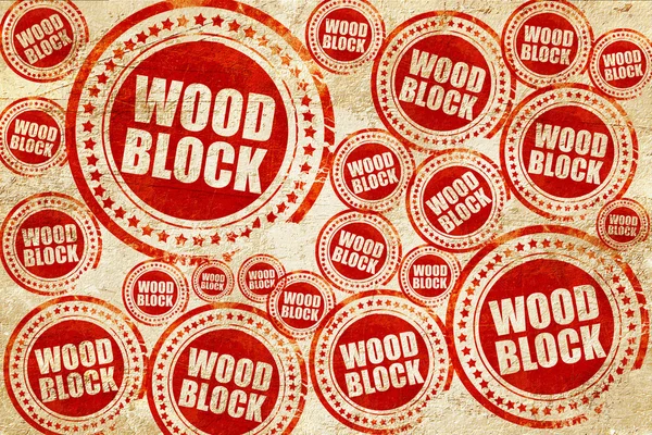Bloque de madera, sello rojo en una textura de papel grunge —  Fotos de Stock