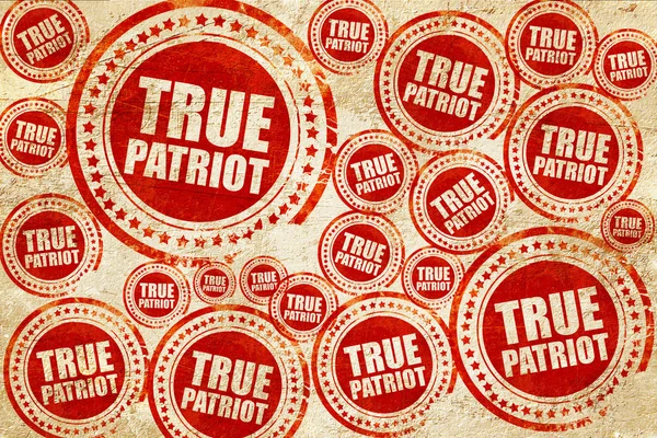 Echte patriot, rode stempel op een grunge papier textuur — Stockfoto