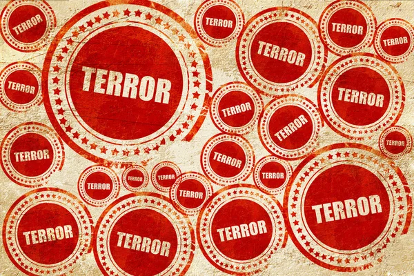 Terror, sello rojo en una textura de papel grunge — Foto de Stock