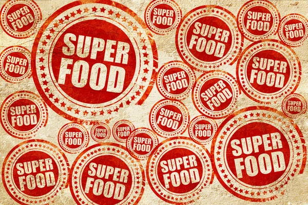 Super aliment, timbre rouge sur une texture de papier grunge — Photo