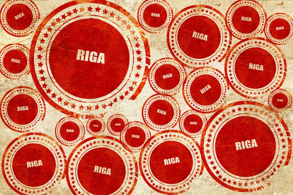 Riga, red stamp on a grunge paper texture — Stock Photo, Image