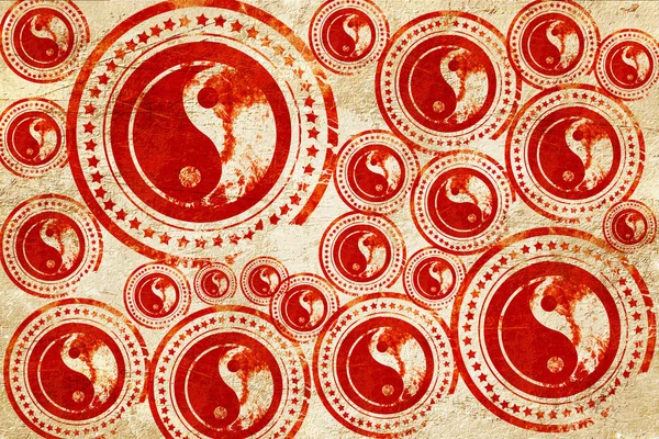 Ying yang symbol, red stamp on a grunge paper texture — 图库照片